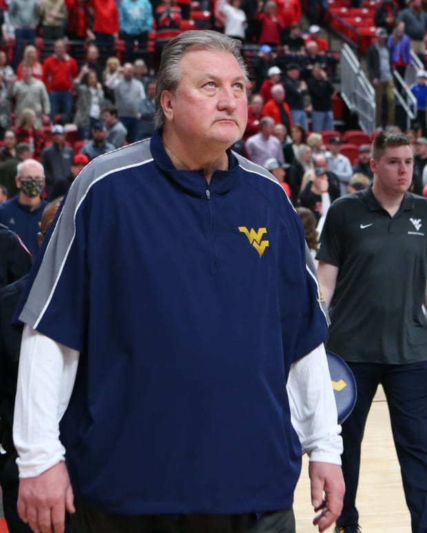 Jan 22, 2022; Lubbock, Texas, USA; West Virginia Mountaineers head coach Bob Huggins enters the United Supermarkets Arena before the game against the Texas Tech Red Raiders. Mandatory Credit: