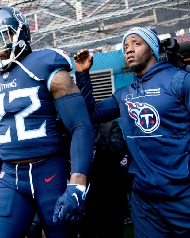 Tennessee Titans running back Derrick Henry (22) steps on to the field to face the Bengals during the AFC Divisional playoff game at Nissan Stadium Saturday, Jan. 22, 2022 in Nashville, Tenn.