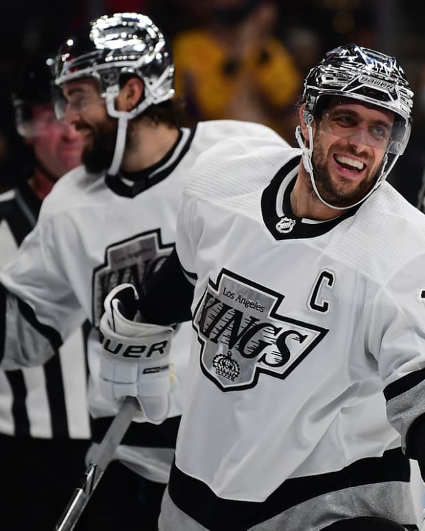 Jan 20, 2022; Los Angeles, California, USA; Los Angeles Kings center Anze Kopitar (11) celebrates his power play goal scored against the Colorado Avalanche during the second period at Crypto.com Arena. Mandatory Credit: Gary A. Vasquez-USA TODAY Sports