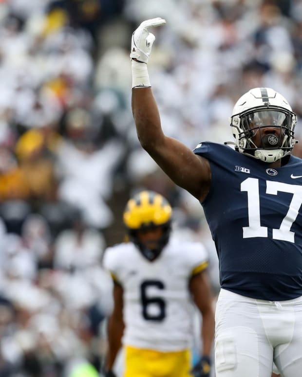 Nov 13, 2021; University Park, Pennsylvania, USA; Penn State Nittany Lions defensive end Arnold Ebiketie (17) reacts follow a sack on Michigan Wolverines quarterback Cade McNamara (12) (not pictured) during the second quarter at Beaver Stadium.