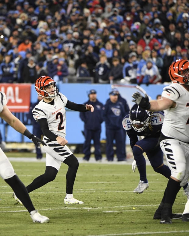 Jan 22, 2022; Nashville, Tennessee, USA; Cincinnati Bengals kicker Evan McPherson (2) watches a game-winning 52-yard field goal in the fourth quarter off the AFC Divisional playoff football game against the Tennessee Titans at Nissan Stadium. The Bengals won the game 19-16. Mandatory Credit: Steve Roberts-USA TODAY Sports