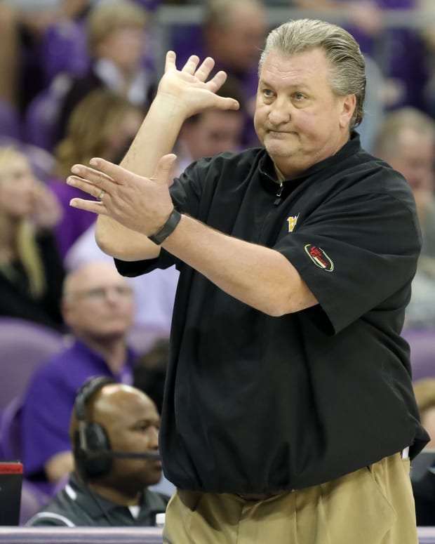 Jan 22, 2018; Fort Worth, TX, USA; West Virginia Mountaineers head coach Bob Huggins gestures during the second half against the TCU Horned Frogs at Ed and Rae Schollmaier Arena.