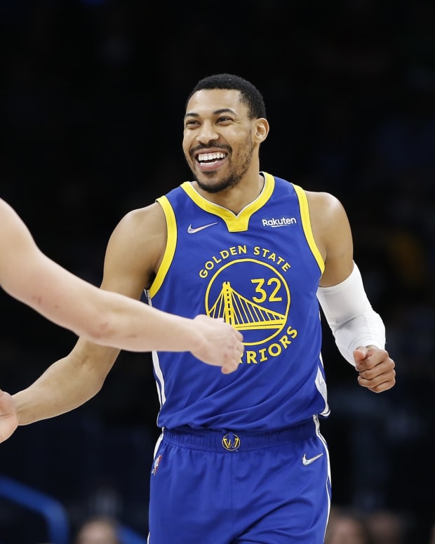 Feb 7, 2022; Oklahoma City, Oklahoma, USA; Golden State Warriors forward Otto Porter Jr. (32) celebrates with guard Klay Thompson (11) after scoring against the Golden State Warriors during the second half at Paycom Center. Golden State won 110-98. Mandatory Credit: Alonzo Adams-USA TODAY Sports
