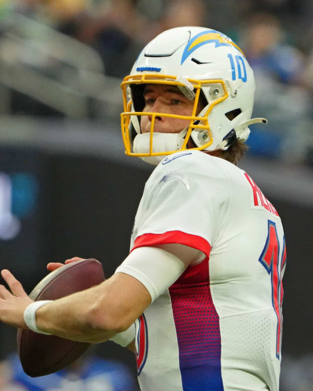 Feb 6, 2022; Paradise, Nevada, USA; AFC quarterback Justin Herbert of the Los Angeles Chargers (10) looks to pass the ball against the NFC during the second quarter during the Pro Bowl football game at Allegiant Stadium. Mandatory Credit: Kirby Lee-USA TODAY Sports