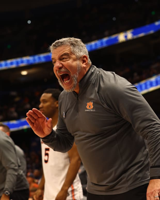 Mar 11, 2022; Tampa, FL, USA; Auburn Tigers head coach Bruce Pearl reacts against the Texas A&M Aggies during the second half at Amalie Arena. Mandatory Credit: Kim Klement-USA TODAY Sports