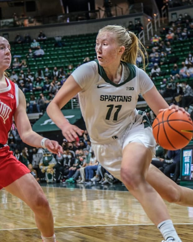 Michigan State's Matilda Ekh (11) drives to the basket as Ohio State's Taylor Mikesell (24) guards her Sunday, Feb. 27, 2022 at the Breslin Center.

Msu Osu Womens Basketball 11