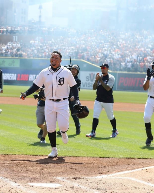 Detroit Tigers DH Miguel Cabrera (24) celebrates his 3000 hit against Colorado Rockies starting pitcher Antonio Senzatela (49) during first inning action Saturday, April 23, 2022 at Comerica Park.