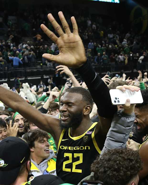 Frank Kepnang celebrates with the Oregon fans.