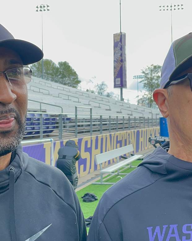 Dana Hall and Shane Pahukoa, UW national championship defensive backs, were together again at practice.