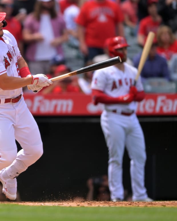 Apr 28, 2022; Anaheim, California, USA; Los Angeles Angels center fielder Mike Trout (27) drives in a run on a fielders choice in the third inning of the game against the Cleveland Guardians at Angel Stadium. Mandatory Credit: Jayne Kamin-Oncea-USA TODAY Sports