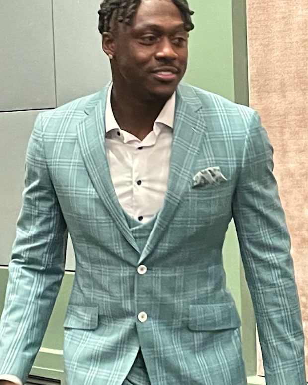 A.J. Brown gets ready for his Eagles introductory press conference on May 2, 2022