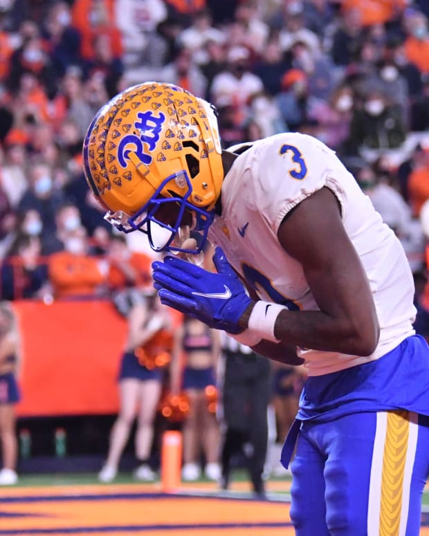 Pittsburgh Panthers wide receiver Jordan Addison (3) bows in the end zone after scoring a touchdown against the Syracuse Orange in the third quarter at the Carrier Dome.