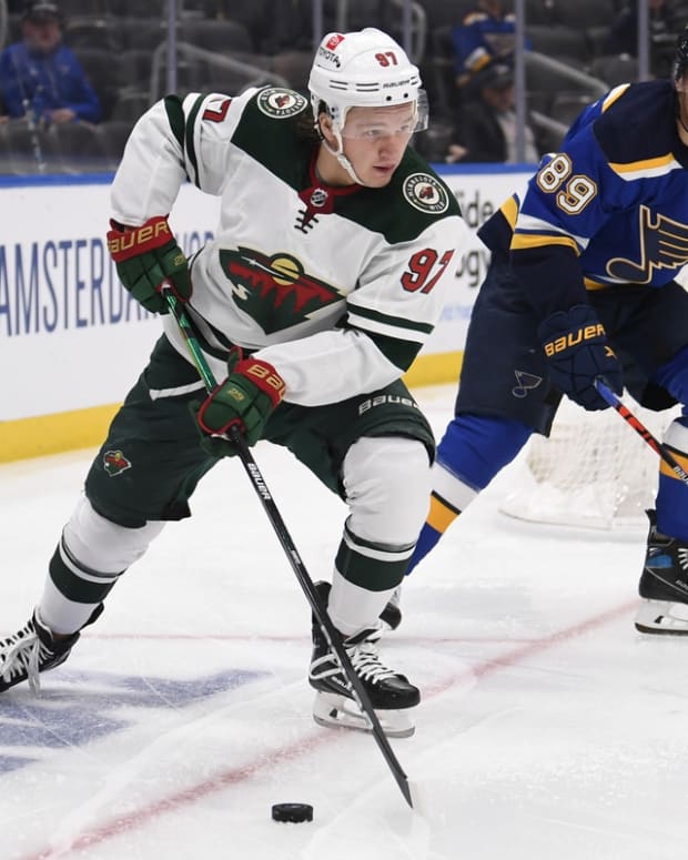 May 6, 2022; St. Louis, Missouri, USA; Minnesota Wild left wing Kirill Kaprizov (97) controls the puck from St. Louis Blues left wing Pavel Buchnevich (89) during the second period in game three of the first round of the 2022 Stanley Cup Playoffs at Enterprise Center. Mandatory Credit: Jeff Le-USA TODAY Sports