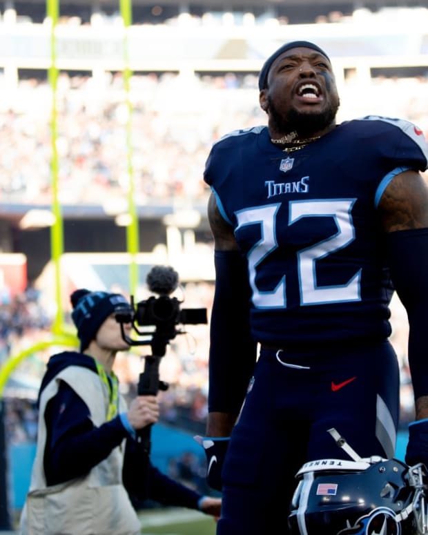 Tennessee Titans running back Derrick Henry (22) takes the field before an NFL divisional playoff football game, Saturday, Jan. 22, 2022, at Nissan Stadium in Nashville, Tenn. Cincinnati Bengals defeated Tennessee Titans 19-16.