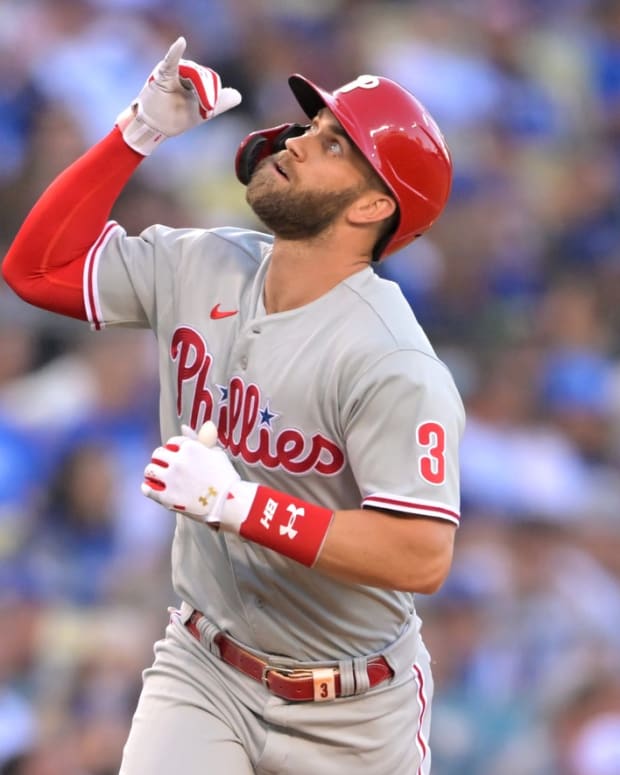 May 12, 2022; Los Angeles, California, USA; Philadelphia Phillies right fielder Bryce Harper (3) rounds third base after hitting a solo home run in the first inning against the Los Angeles Dodgers at Dodger Stadium. Mandatory Credit: Jayne Kamin-Oncea-USA TODAY Sports