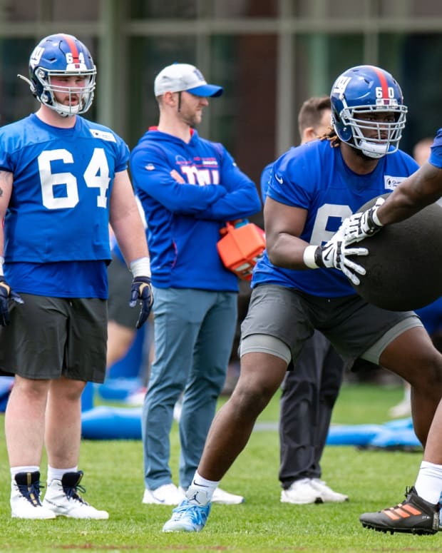 May 13, 2022; East Rutherford, NJ, USA; New York Giants offensive lineman Marcus McKethan (60) practices a drill during rookie camp at Quest Diagnostics Training Center.