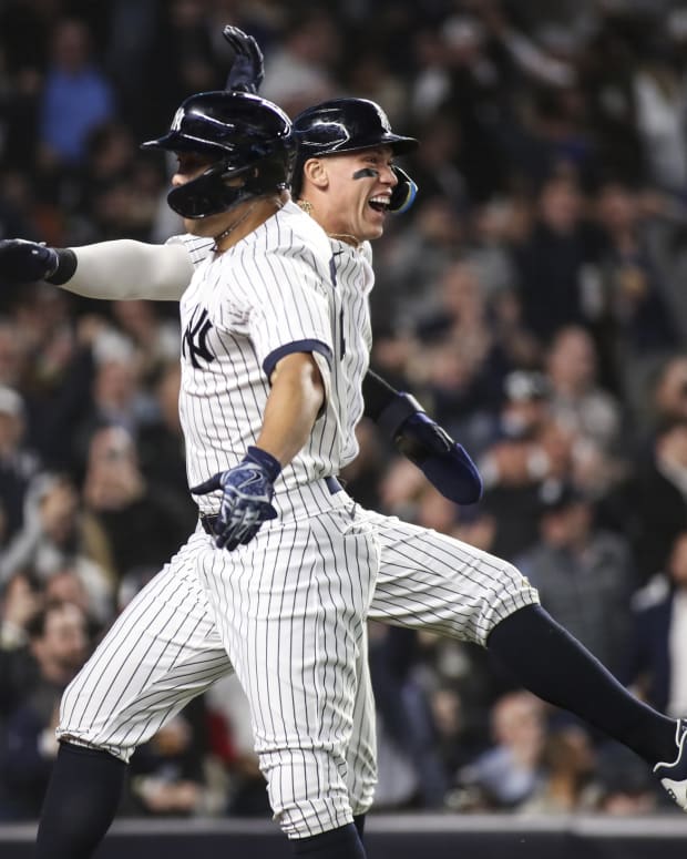 New York Yankees sluggers Aaron Judge and Giancarlo Stanton celebrate home run