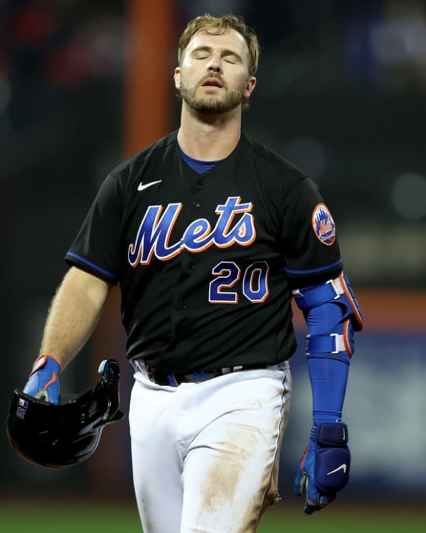 May 13, 2022; New York City, New York, USA; New York Mets first baseman Pete Alonso (20) reacts after flying out to the wall against the Seattle Mariners during the eighth inning at Citi Field. Mandatory Credit: Brad Penner-USA TODAY Sports