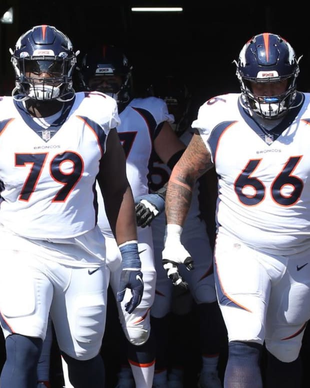 Denver Broncos center Lloyd Cushenberry (79) and guard Dalton Risner (66) lead the team out of the tunnel to play the Pittsburgh Steelers at Heinz Field.
