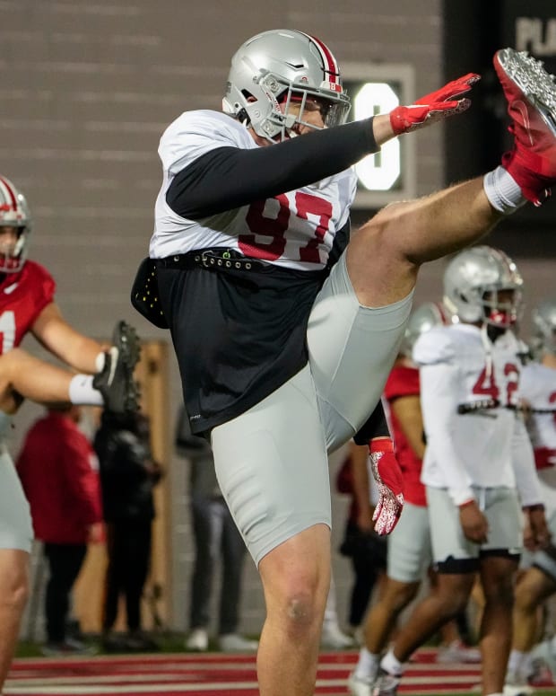 Ohio State Buckeyes defensive lineman Noah Potter (97) stretches during a spring football practice at the Woody Hayes Athletics Center in Columbus on March 22, 2022. Ncaa Football Ohio State Spring Practice