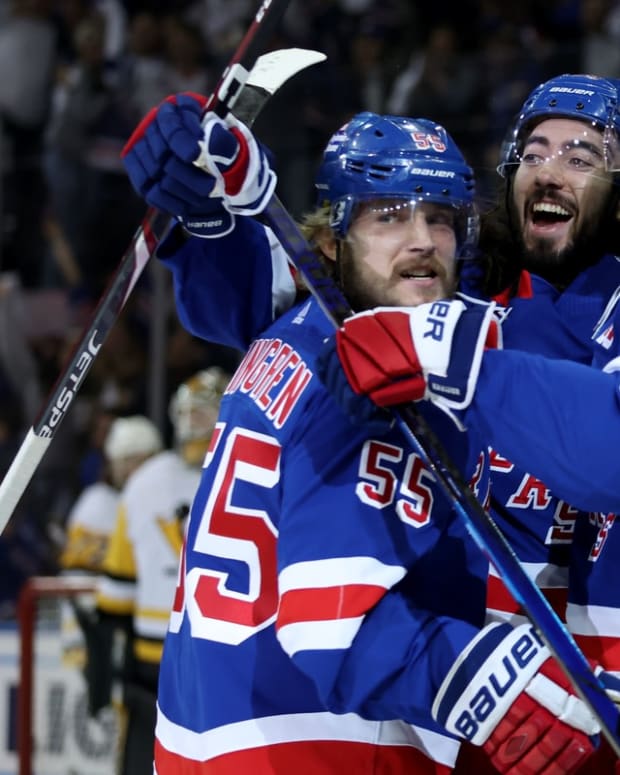 May 15, 2022; New York, New York, USA; New York Rangers left wing Chris Kreider (20) celebrates his goal against the Pittsburgh Penguins with defenseman Ryan Lindgren (55) and center Mika Zibanejad (93) during the first period of game seven of the first round of the 2022 Stanley Cup Playoffs at Madison Square Garden. Mandatory Credit: Brad Penner-USA TODAY Sports