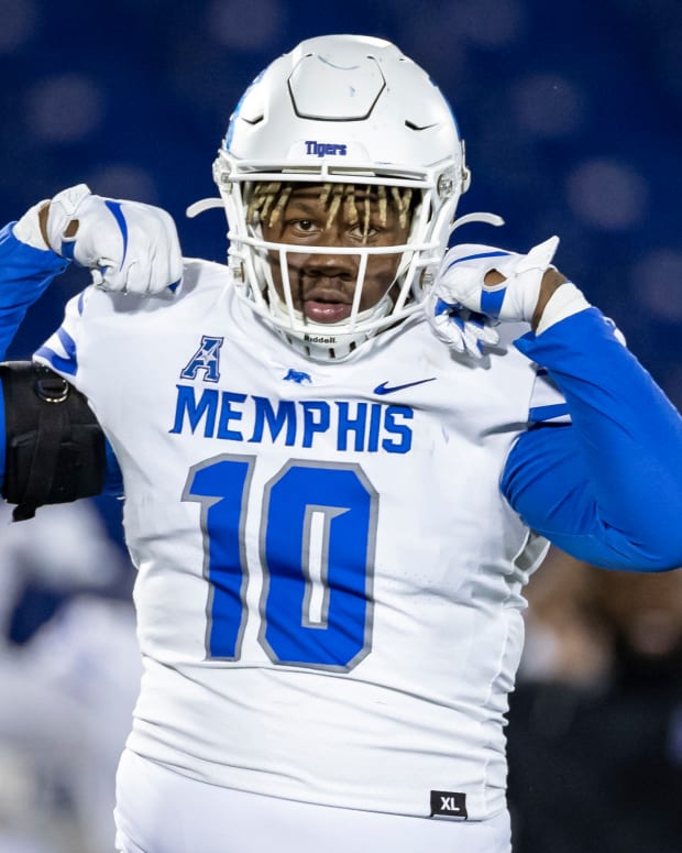Nov 28, 2020; Annapolis, Maryland, USA; Memphis Tigers defensive lineman Morris Joseph (10) celebrates after recording a sack against the Navy Midshipmen during the first half at Navy-Marine Corps Memorial Stadium. Mandatory Credit: Scott Taetsch-USA TODAY Sports