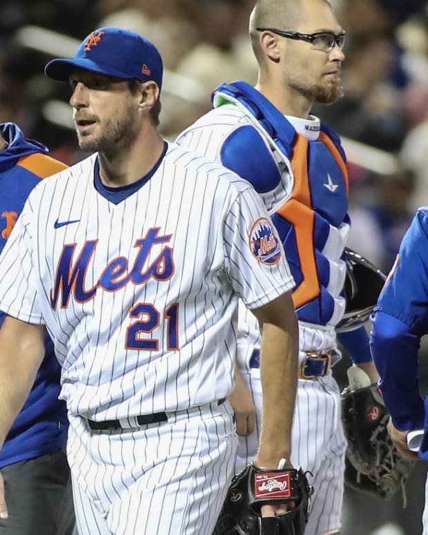 May 18, 2022; New York City, New York, USA; New York Mets starting pitcher Max Scherzer (21) is taken out because of an injury in the sixth inning against the St. Louis Cardinals at Citi Field.