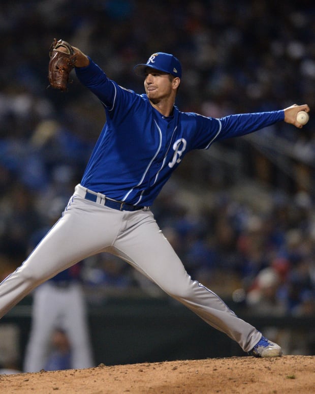 Mar 8, 2019; Phoenix, AZ, USA; Kansas City Royals relief pitcher Foster Griffin (60) works against a Los Angeles Dodgers batter during the fifth inning at Camelback Ranch. Mandatory Credit: Orlando Ramirez-USA TODAY Sports
