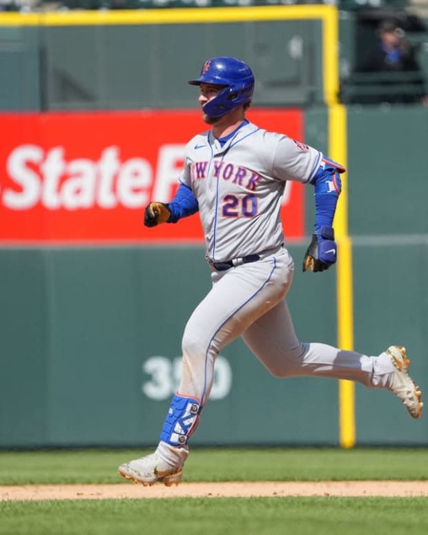 May 21, 2022; Denver, Colorado, USA; New York Mets designated hitter Pete Alonso (20) runs out a double in the ninth inning against the Colorado Rockies at Coors Field. Mandatory Credit: Ron Chenoy-USA TODAY Sports