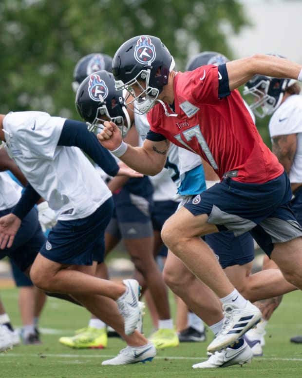Tennessee Titans quarterback Ryan Tannehill (17) warms up with teammates during practice at Saint Thomas Sports Park Tuesday, May 24, 2022, in Nashville, Tenn.