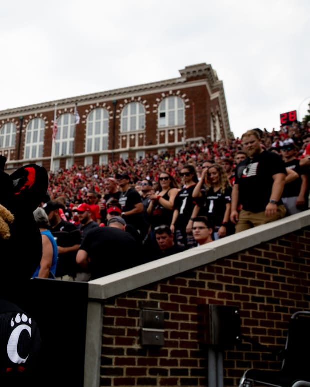 Cincinnati Bearcats mascot the Bearcat looks on in the first half of the NCAA football game between the Cincinnati Bearcats and the Miami Redhawks on Saturday, Sept. 4, 2021, at Nippert Stadium in Cincinnati. Cincinnati Bearcats Miami Redhawks