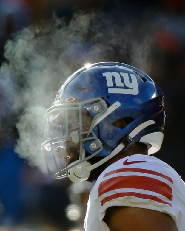 Jan 2, 2022; Chicago, Illinois, USA; The breath of New York Giants cornerback Julian Love (20) is visible in the cold air between plays against the Chicago Bears during the first half at Soldier Field.