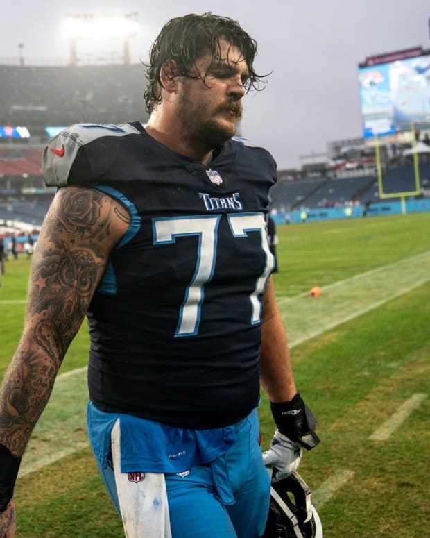Tennessee Titans offensive tackle Taylor Lewan (77) exits the field after their loss to the Houston Texans at Nissan Stadium in Nashville, Tenn., Sunday, Nov. 21, 2021.