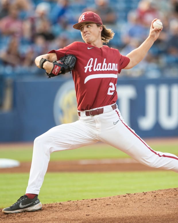 Alabama pitcher Grayson Hitt (26) pitches as Alabama Crimson Tide takes on Texas A&M Aggies during the SEC baseball tournament at the Hoover Metropolitan Stadium in Hoover, Ala., on Friday