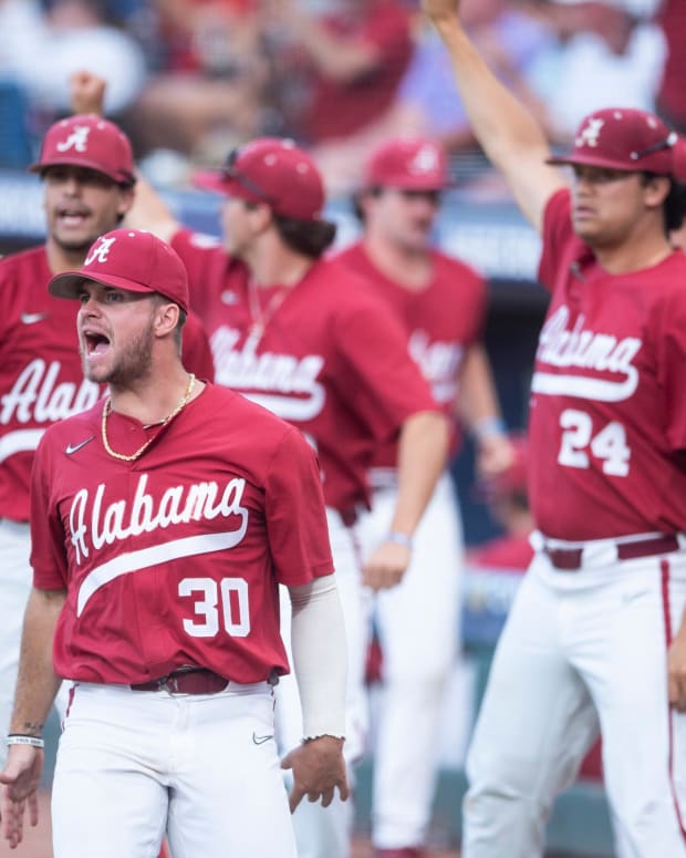 Alabama dugout reacts to a run scored as Alabama Crimson Tide takes on Texas A&M Aggies during the SEC baseball tournament at the Hoover Metropolitan Stadium in Hoover, Ala., on Friday, May 27, 2022.