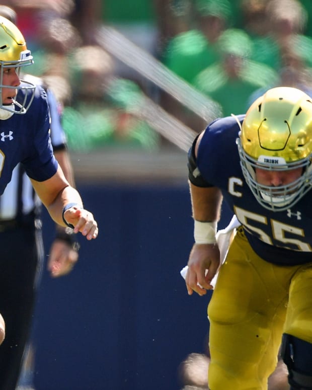 Notre Dame football quarterback Tyler Buchner in action during a game between teams in the AP Top 25 college football rankings.