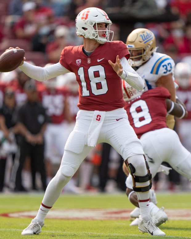 Stanford Cardinal quarterback Tanner McKee (18) throws the football against the UCLA Bruins during the first quarter at Stanford Stadium.