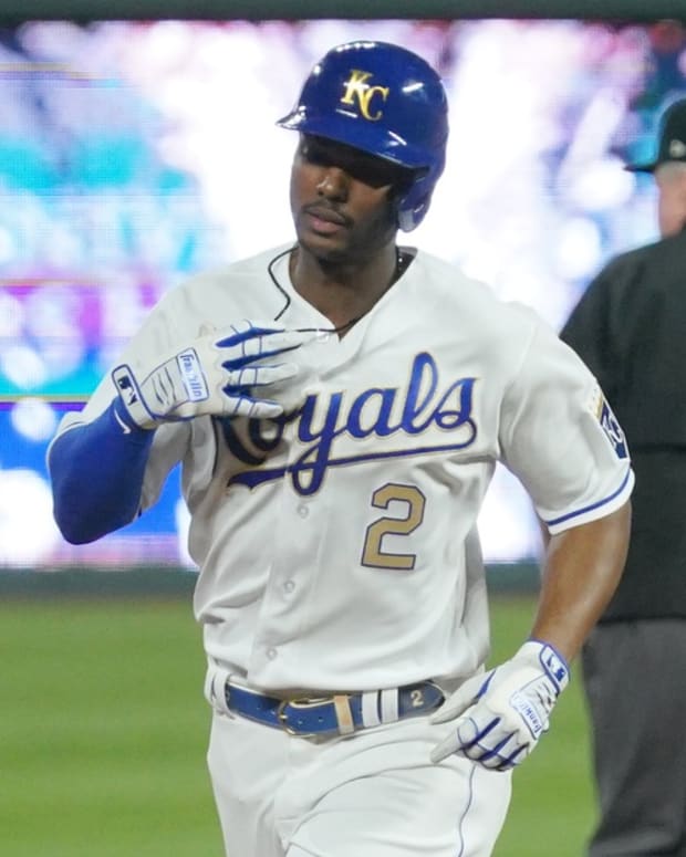 May 21, 2021; Kansas City, Missouri, USA; Kansas City Royals center fielder Michael A. Taylor (2) celebrates while running the bases after hitting a two run home run in the sixth inning against the Detroit Tigers at Kauffman Stadium. Mandatory Credit: Denny Medley-USA TODAY Sports