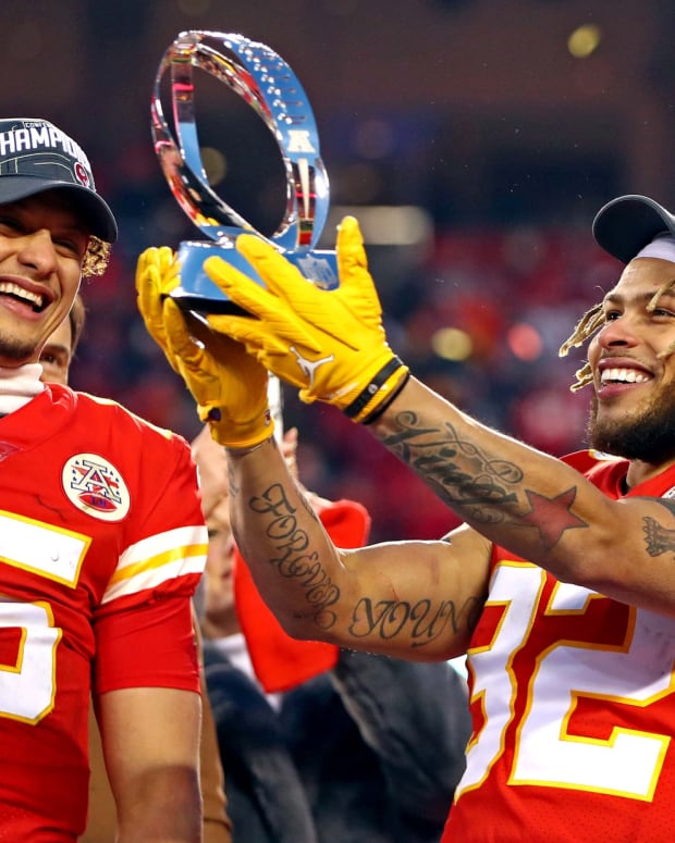 Jan 19, 2020; Kansas City, Missouri, USA; Kansas City Chiefs quarterback Patrick Mahomes (15) and strong safety Tyrann Mathieu (32) celebrate with the Lamar Hunt Trophy after beating the Tennessee Titans in the AFC Championship Game at Arrowhead Stadium. Mandatory Credit: Mark J. Rebilas-USA TODAY Sports