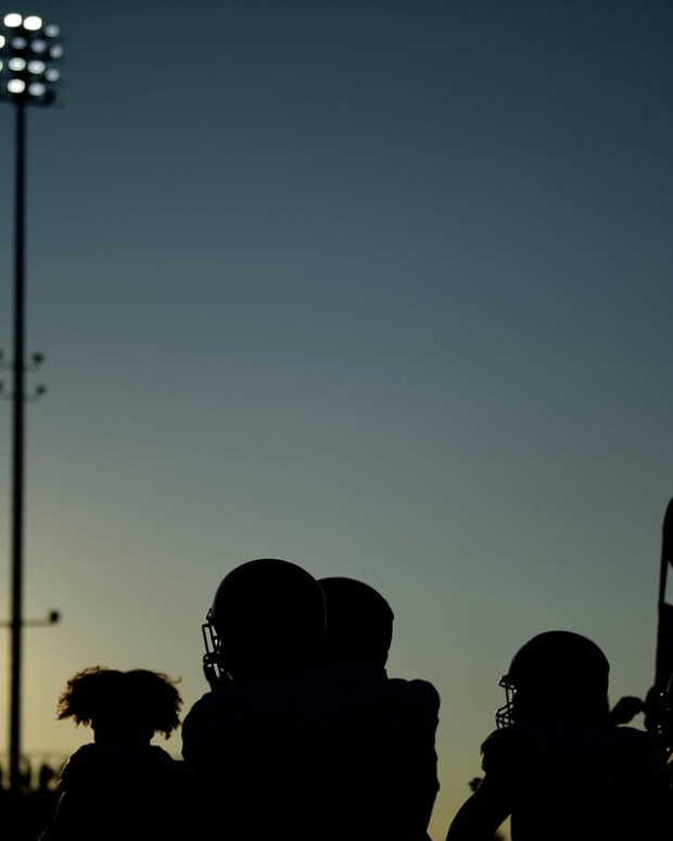 The sun sets over the Fulton sideline during a game between Austin-East and Fulton in Knoxville, Tenn. on Friday, Aug. 20, 2021.

Kns Austin East Fulton Football