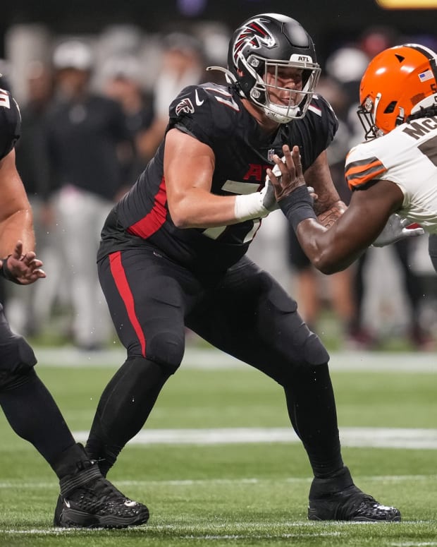 Aug 29, 2021; Atlanta, Georgia, USA; Atlanta Falcons offensive tackle Jalen Mayfield (77) blocks against Cleveland Browns defensive tackle Malik McDowell (58) during the first half at Mercedes-Benz Stadium. Mandatory Credit: Dale Zanine-USA TODAY Sports