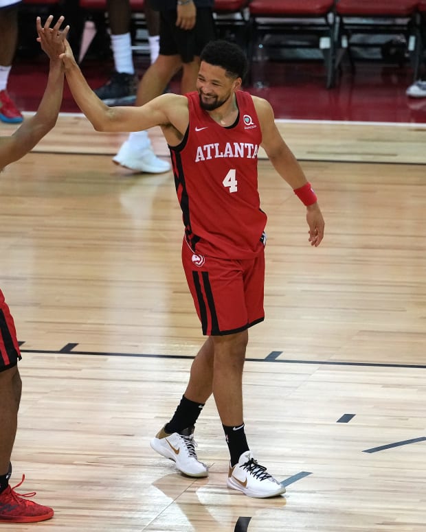 Atlanta Hawks guard Sharife Cooper (2) celebrates with guard Skylar Mays (4) after scoring the game winning basket against the Indiana Pacers to give the Hawks a 84-83 victory during an NBA Summer League game at Cox Pavilion.
