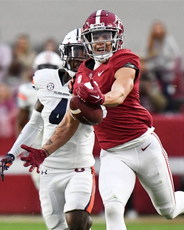 Alabama wide receiver Jermaine Burton (3) reaches out for a long pass with Auburn cornerback D.J. James (4) defending at Bryant-Denny Stadium. The pass was incomplete.