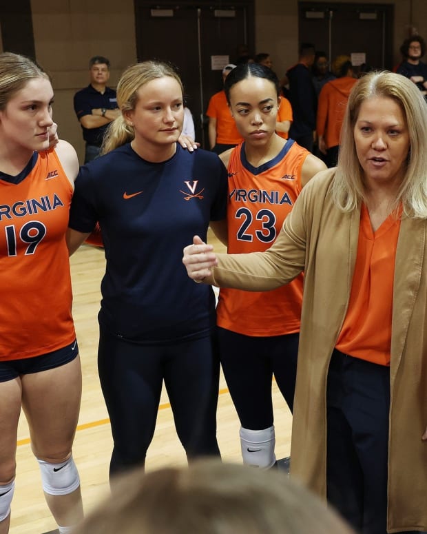 Shannon Wells coaches her team during the Virginia volleyball match against Virginia Tech at Memorial Gymnasium.
