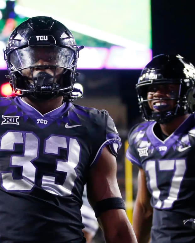 Oct 22, 2022; Fort Worth, Texas, USA; TCU Horned Frogs running back Kendre Miller (33) celebrate scoring a touchdown against the Kansas State Wildcats in the fourth quarter at Amon G. Carter Stadium