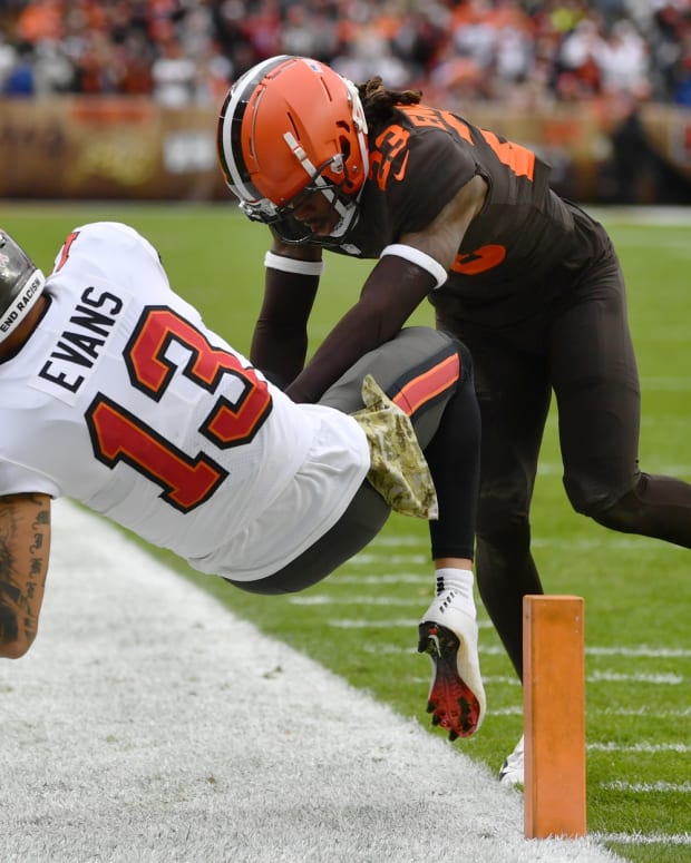 Nov 27, 2022; Cleveland, Ohio, USA; Cleveland Browns cornerback Martin Emerson Jr. (23) knocks Tampa Bay Buccaneers wide receiver Mike Evans (13) out of bounds during the first half at FirstEnergy Stadium. Mandatory Credit: Ken Blaze-USA TODAY Sports