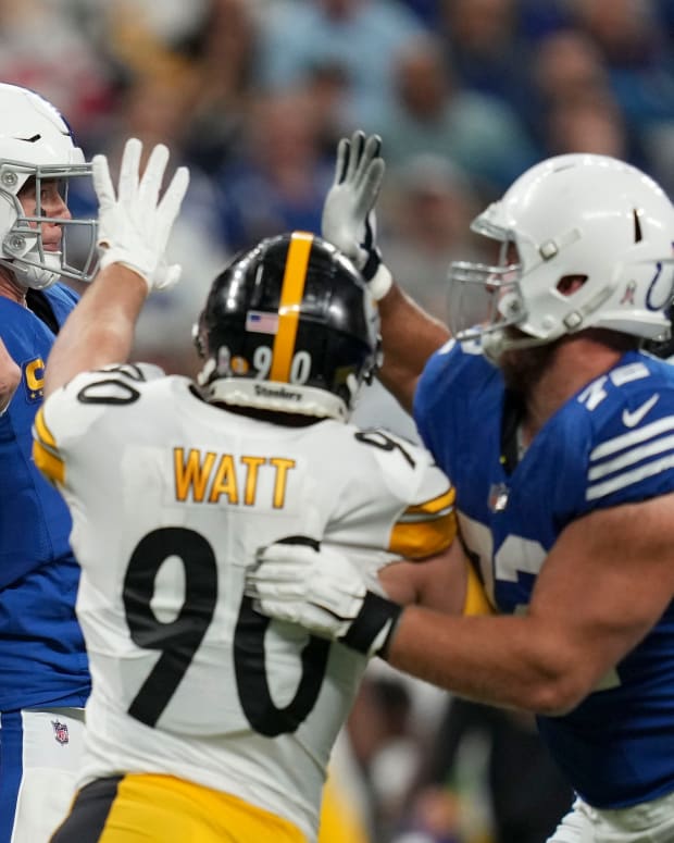 Pittsburgh Steelers linebacker T.J. Watt (90) pressures Indianapolis Colts quarterback Matt Ryan (2) as he draws back to pass Monday, Nov. 28, 2022, during a game against the Pittsburgh Steelers at Lucas Oil Stadium in Indianapolis.