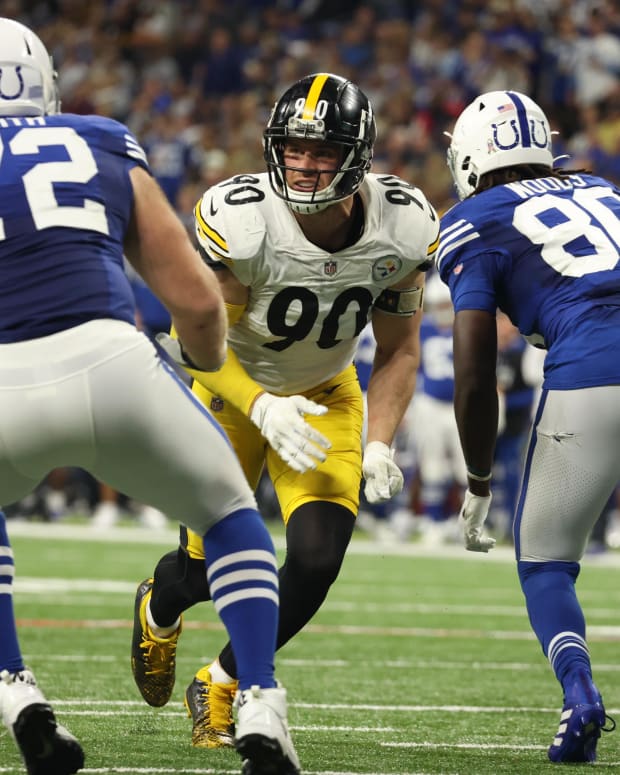 Nov 28, 2022; Indianapolis, Indiana, USA; Indianapolis Colts tackle Braden Smith (72) and tight end Jelani Woods (80) block Pittsburgh Steelers outside linebacker T.J. Watt (90) during the second half at Lucas Oil Stadium.