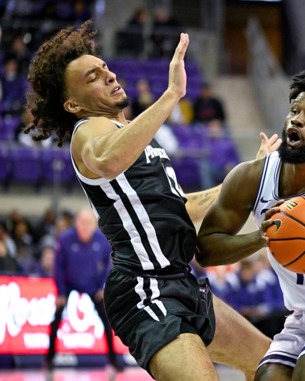 Providence Friars guard Devin Carter (22) defends against TCU Horned Frogs guard Mike Miles Jr. (1) during the first half at Ed and Rae Schollmaier Arena.