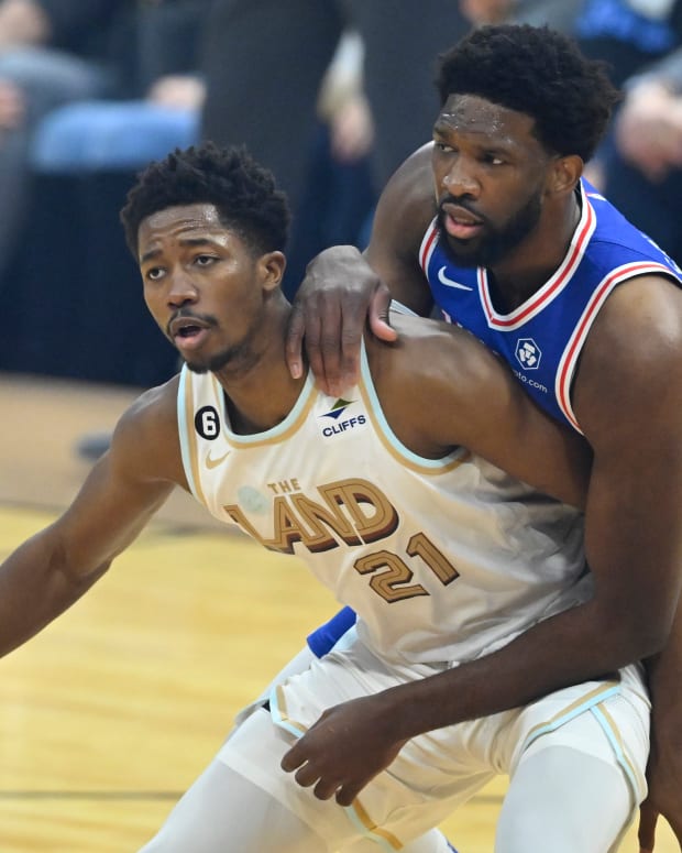 Cleveland Cavaliers forward Mamadi Diakite (21) and Philadelphia 76ers center Joel Embiid (21) look for a rebound in the first quarter at Rocket Mortgage FieldHouse.